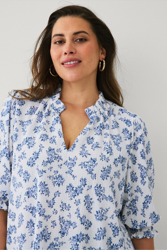 Topp med puffermermer - Blå