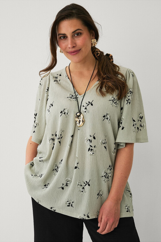 Topp med draperte volangermer - Grønn