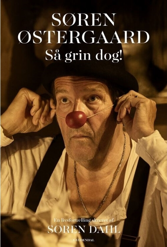Søren Østergaard. Så grin dog! | Søren Østergaard Søren Dahl | Språk: Dansk