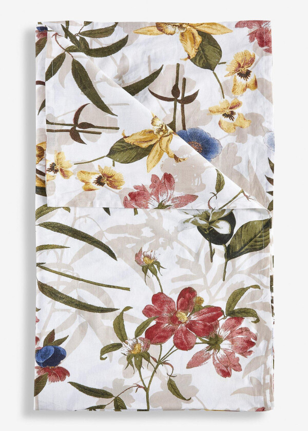 Stort sengeteppe med blomsterdesign