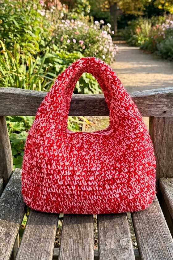 Melert carla loop bag i rød - Strikkia 2026-027-450465