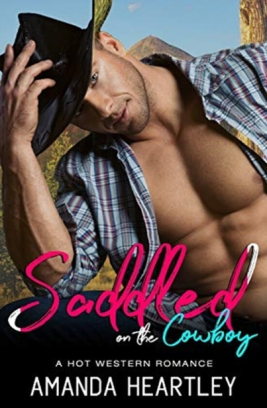 Saddled On The Cowboy av Amanda Heartley (Paperback)