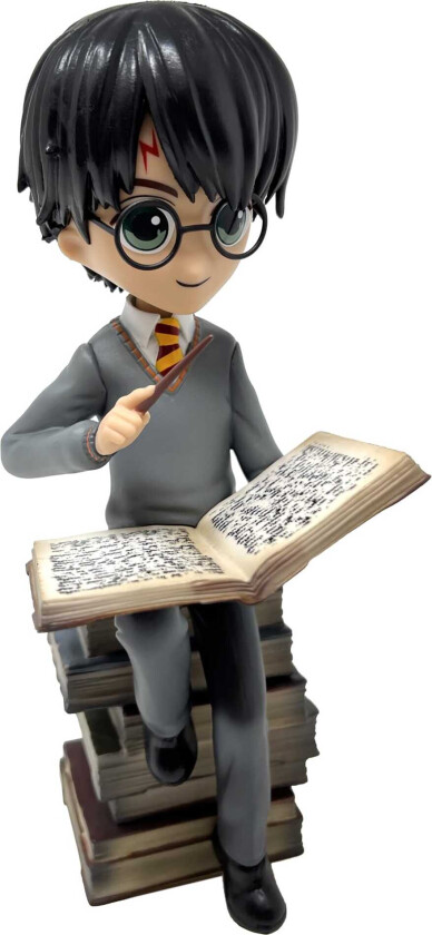 Harry Potter figur (Harry og stabel med magibøker)