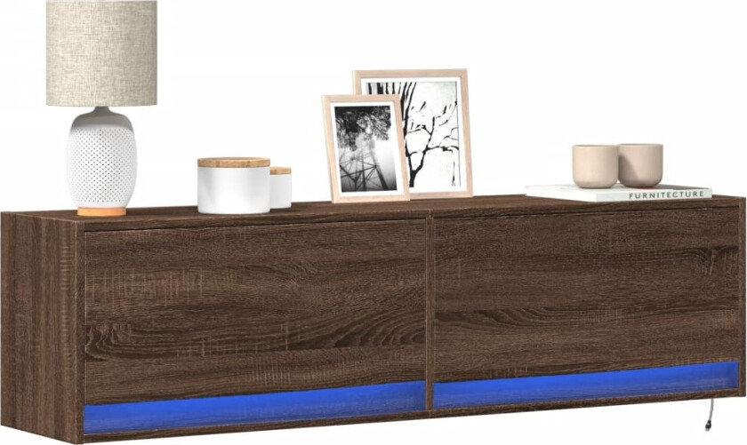 Vegghengt TV-benk med LED brun eik 140x31x38 cm