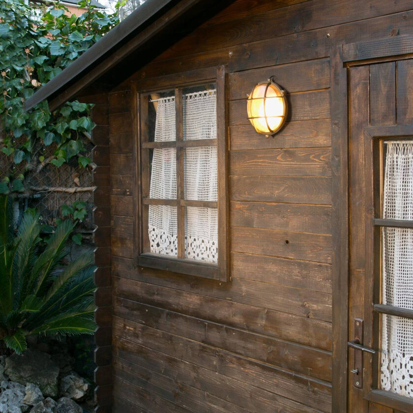 Rund vegglampe Noray, messingfarget