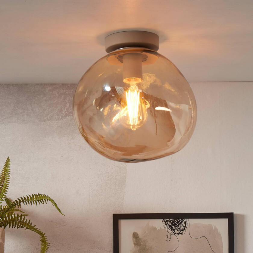 Det dreier seg om RoMi taklampe Helsinki, ravgult