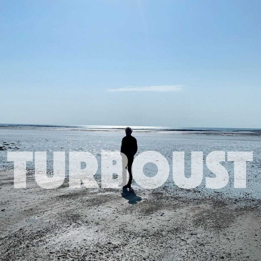 Arnold Turboust Sur La Photo CD