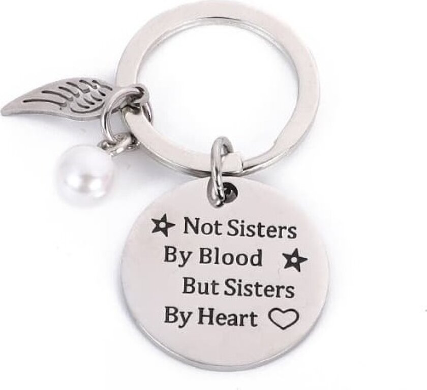 Nøkkelring med vinge og merke med teksten "Sisters by Heart"