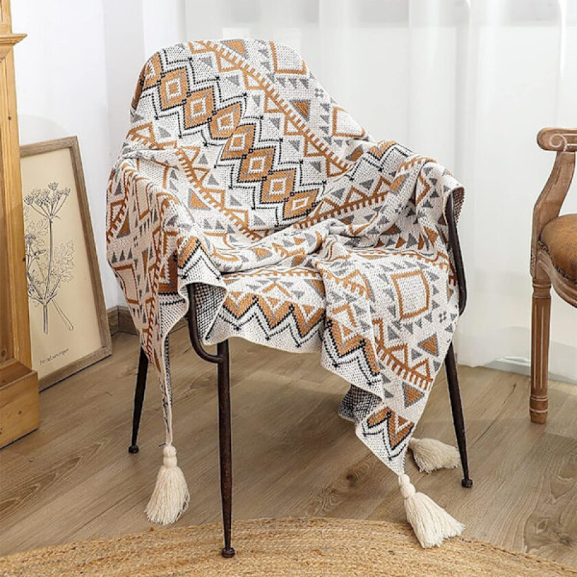 Strikket pledd med vintage dusker, bohemsk etnisk stil, geometrisk mønster, koselig lenestoltrekk, varme pledd