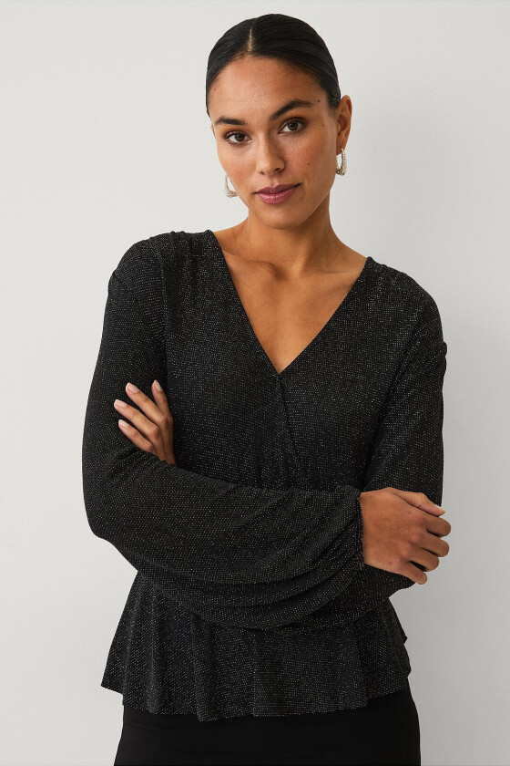 Topp med peplum-design - Svart