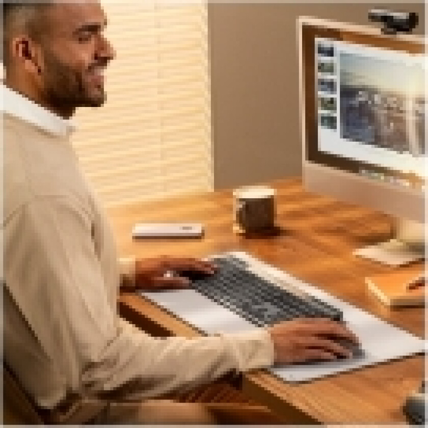 Signature Slim Solar+ K980 - Tastatur - full size - trådløs - Bluetooth LE - QWERTY - US International - tastsvitsj: scissor switches - grafitt