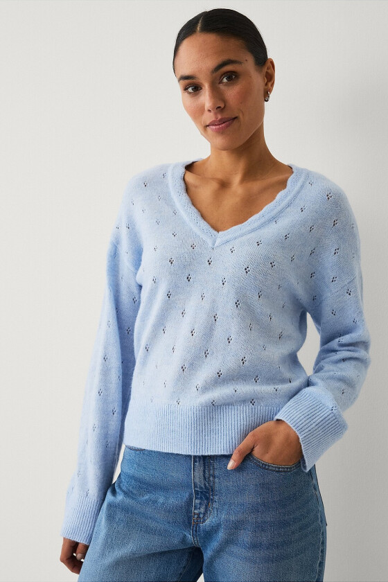 Hullmønstret pullover - Blå