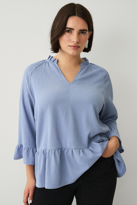 Topp i strukturert jersey - Blå