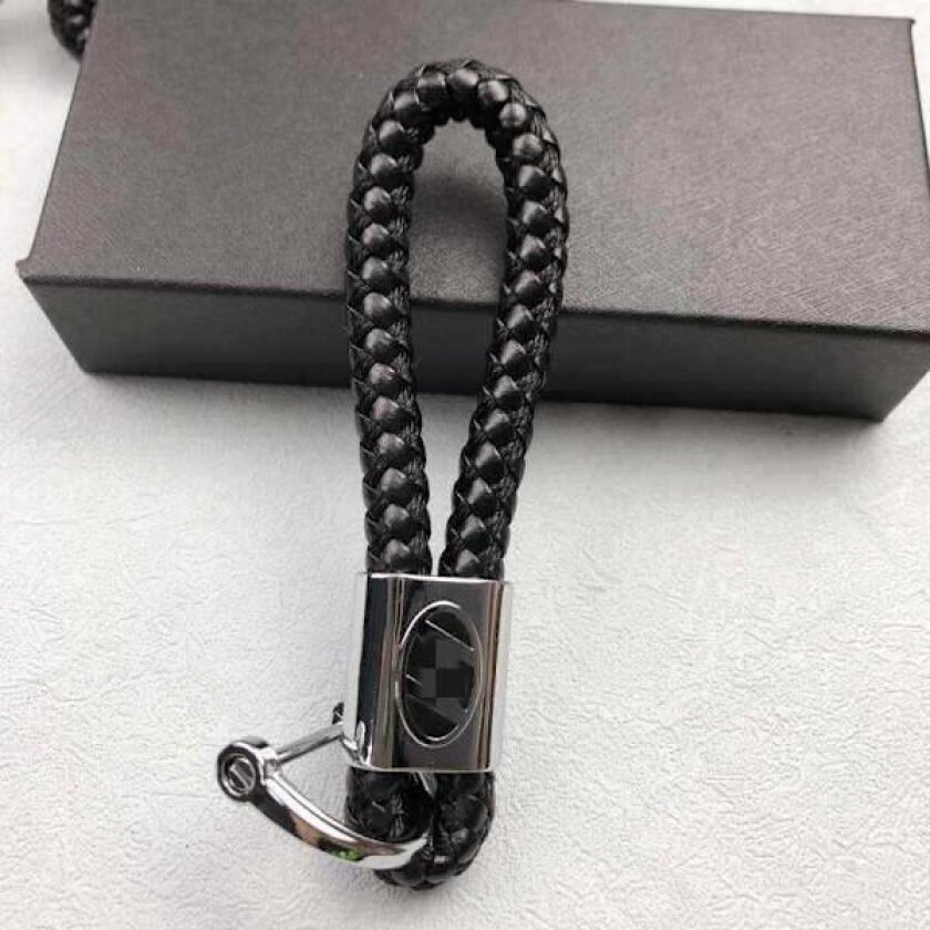 Stilig håndvevd nøkkelring med bil-logo - Elegant unisex nøkkelholder for menn og kvinner Audi