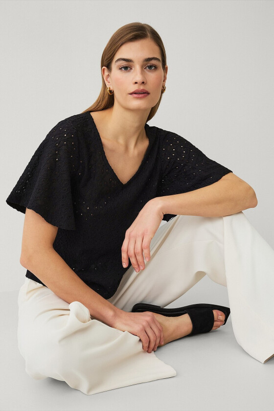 Topp med draperte volangermer - Svart